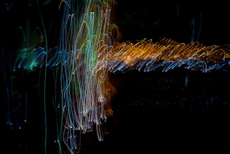 green and orange light streaks