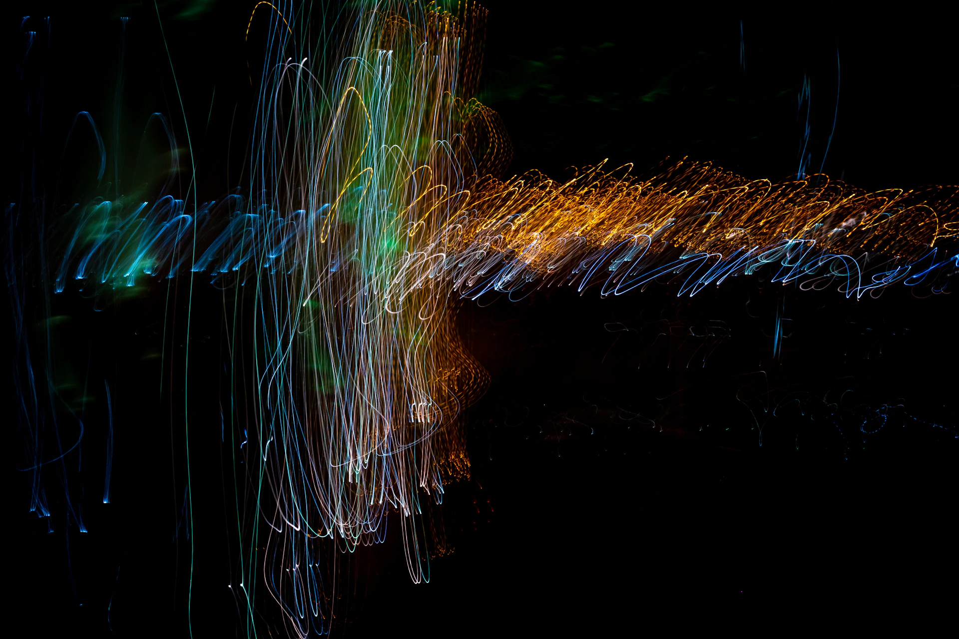 green and orange light streaks