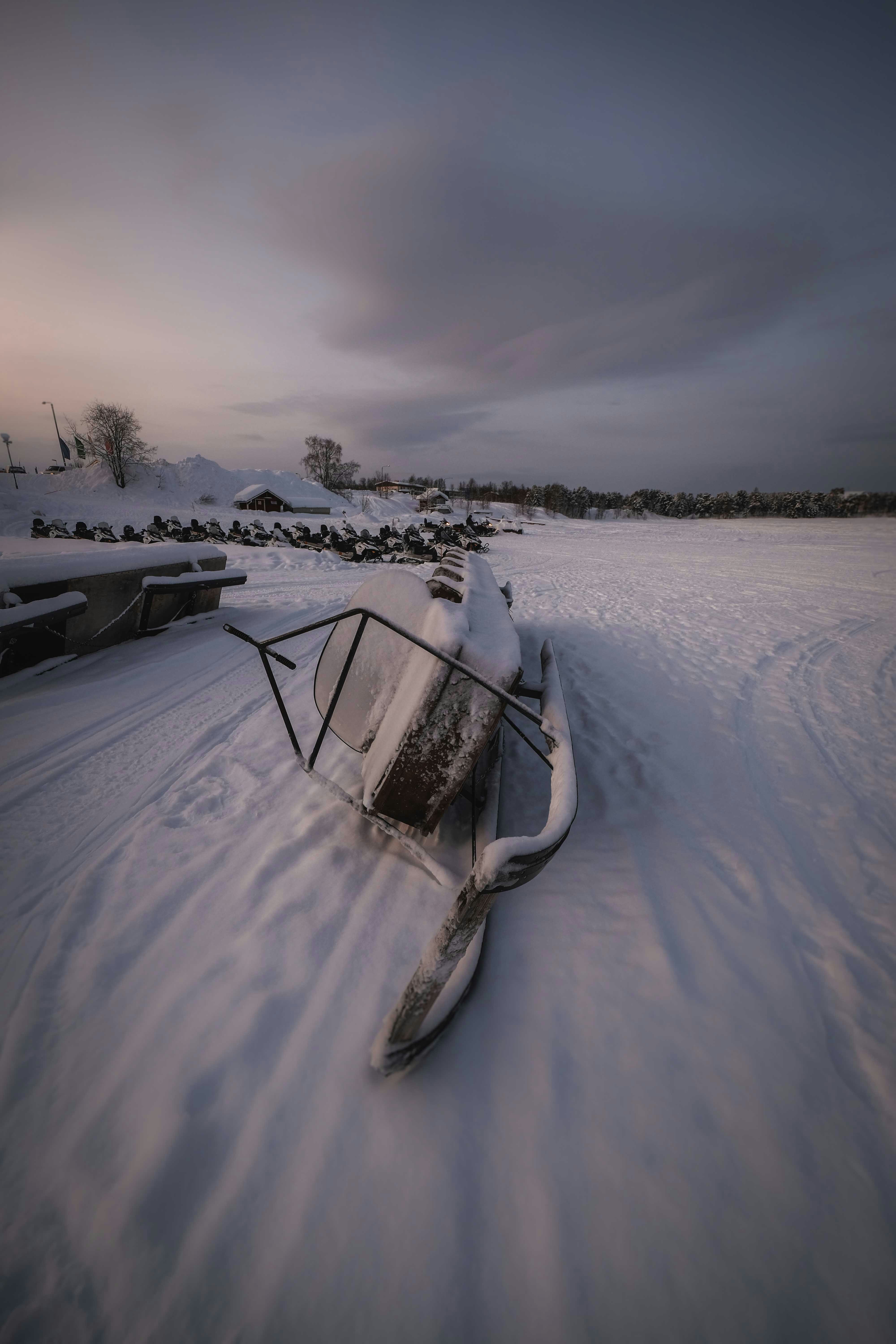 Black boat on snow covered ground during daytime - Free Photo on Unsplash