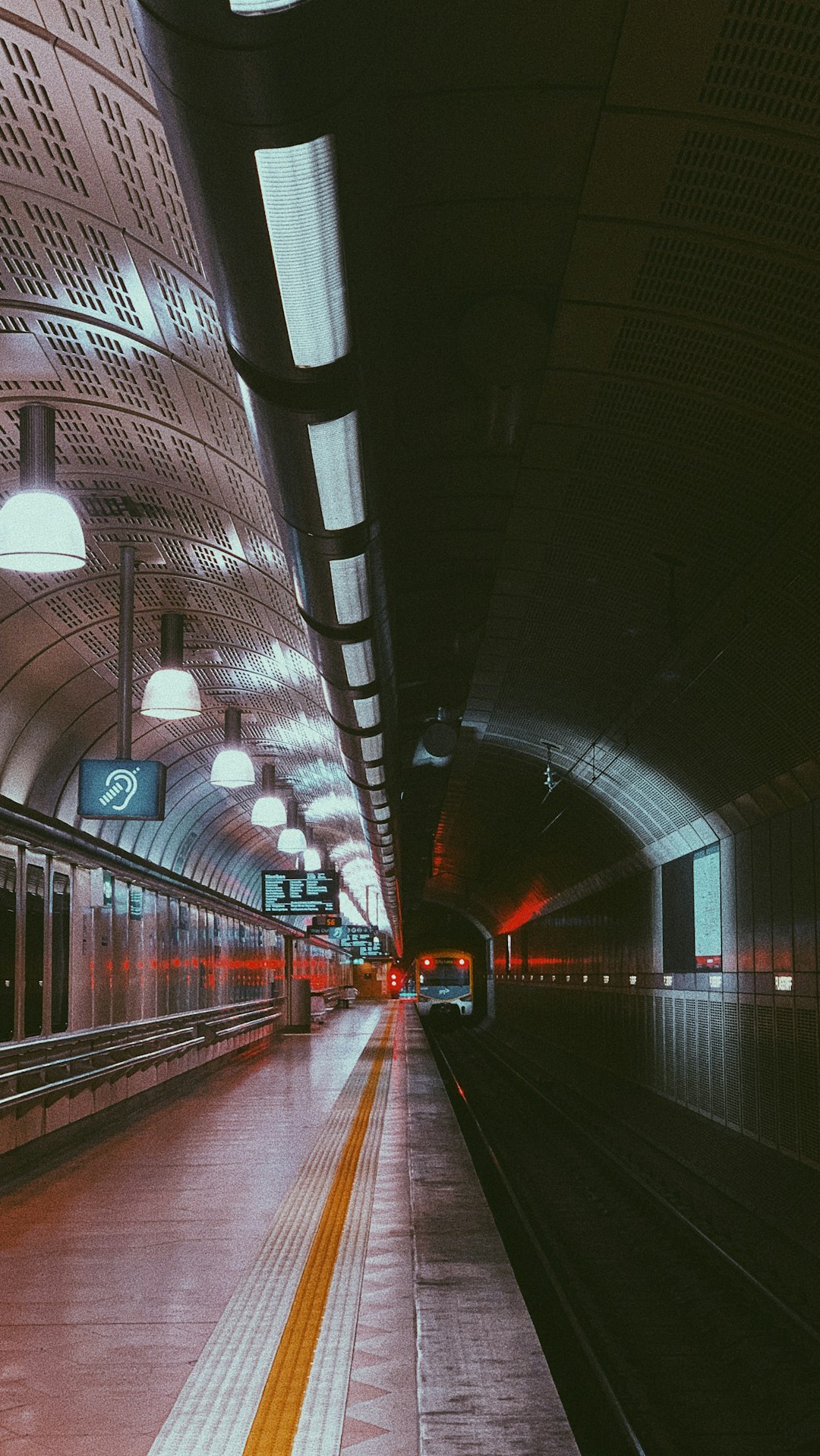 red and white light on train station