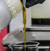 clear glass jar with yellow straw
