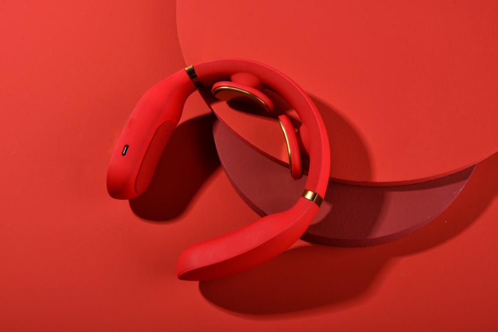 red and white wireless headphones