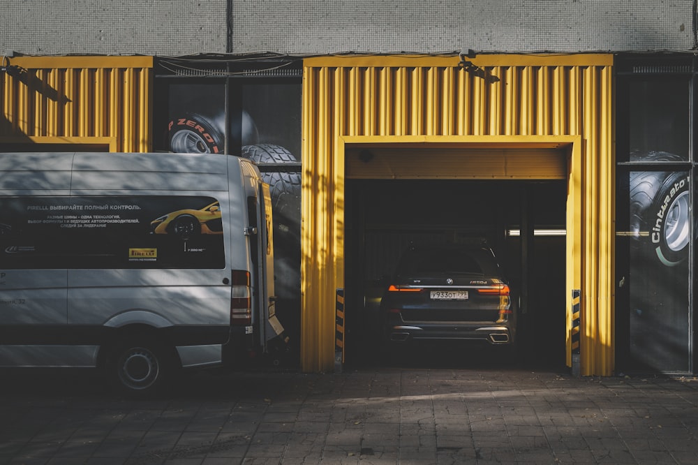 black car in front of a building