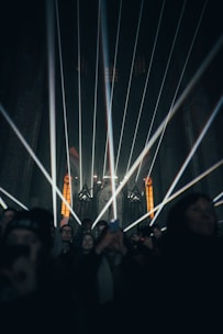 people standing on stage during nighttime