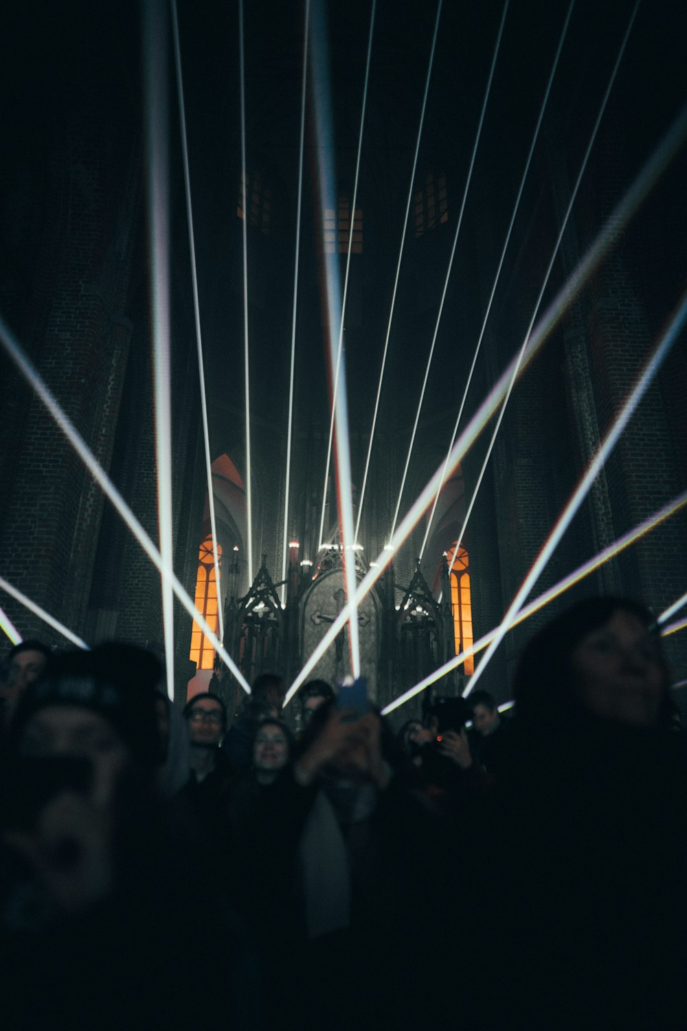 people standing on stage during nighttime