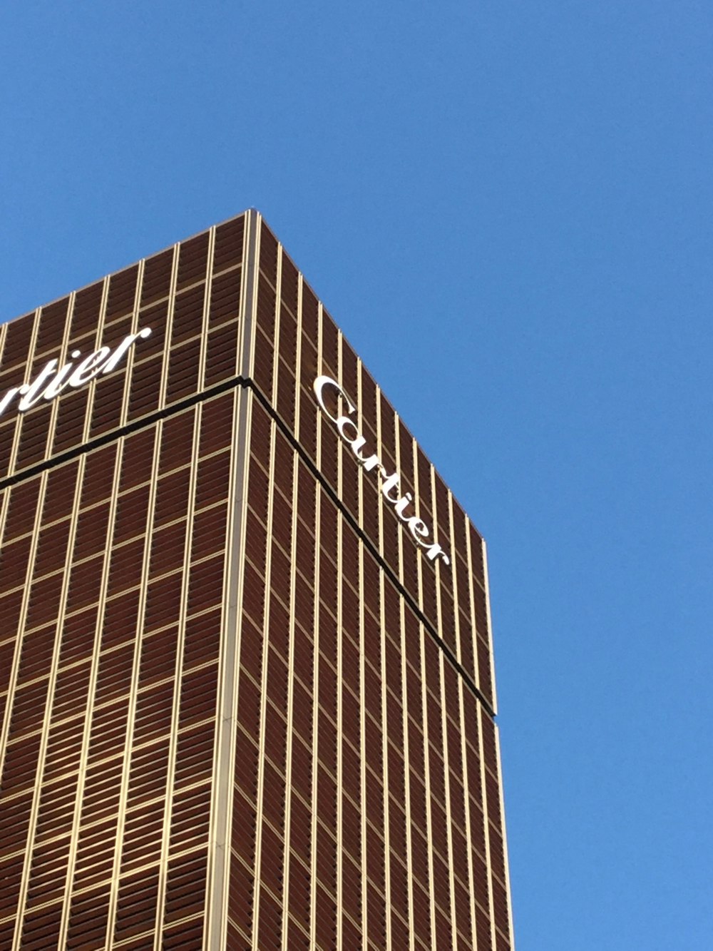 brown concrete building under blue sky during daytime