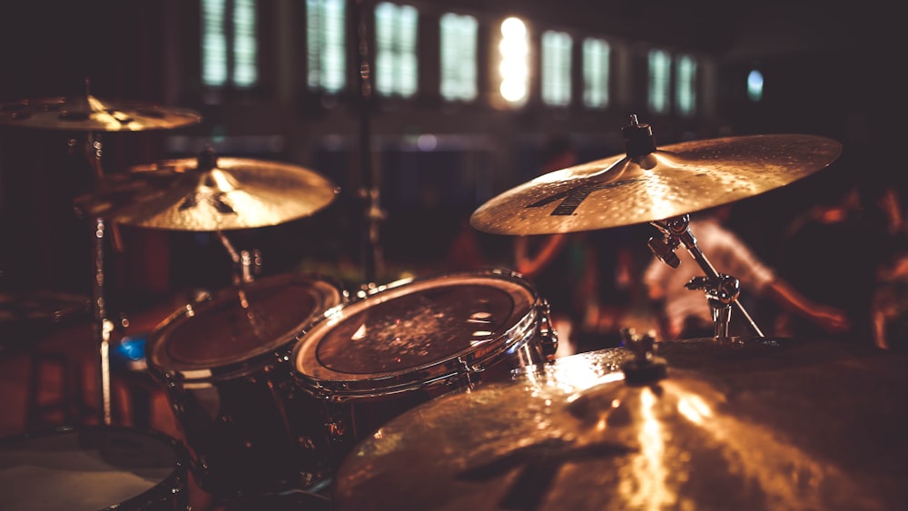 brown and silver drum set