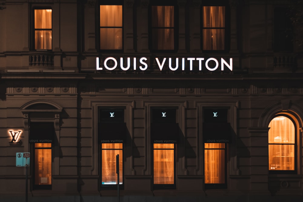 White and red Supreme X Louis Vuitton duffel bag photo – Free Novi sad  Image on Unsplash