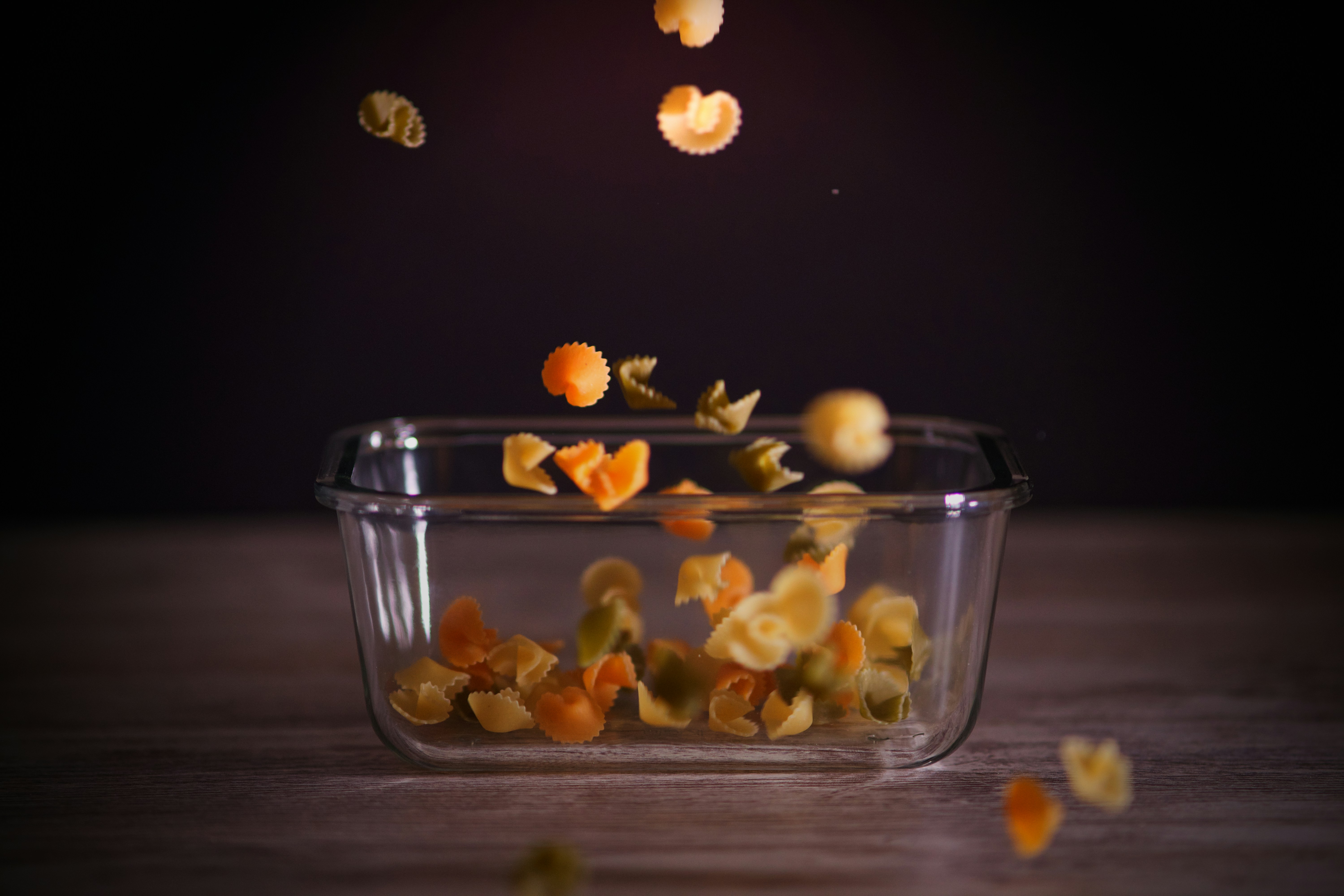 yellow fruits in clear glass bowl