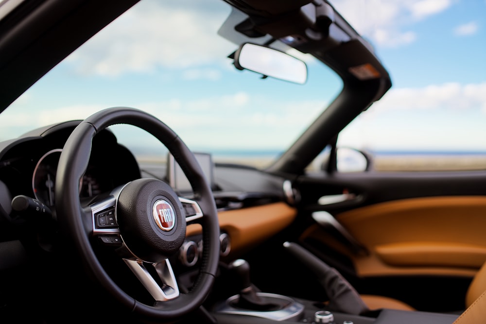 black and orange bmw steering wheel