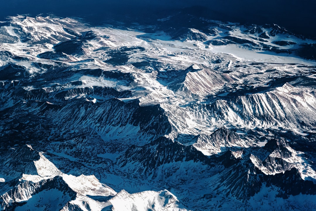 snow covered mountain during daytime