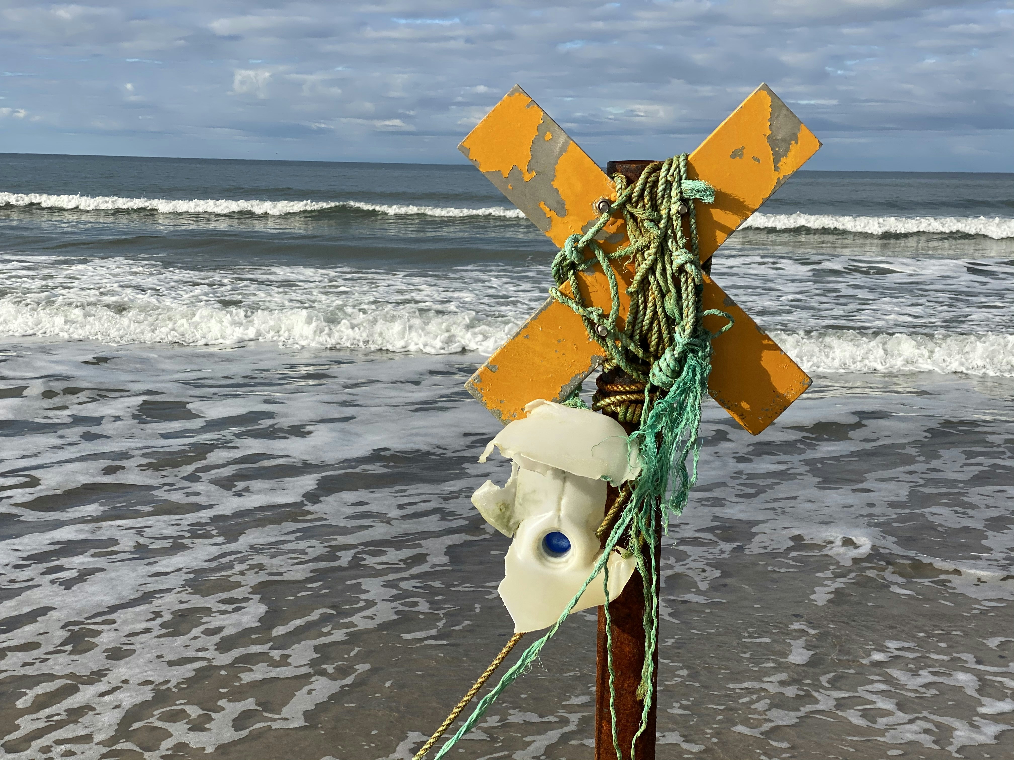 yellow and green paper boat on beach during daytime