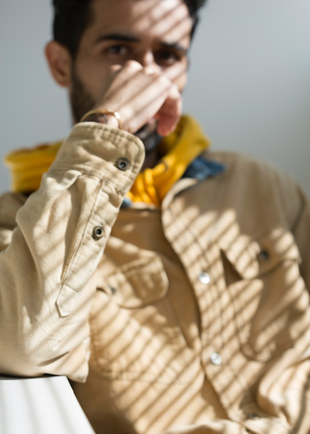 man in brown button up shirt