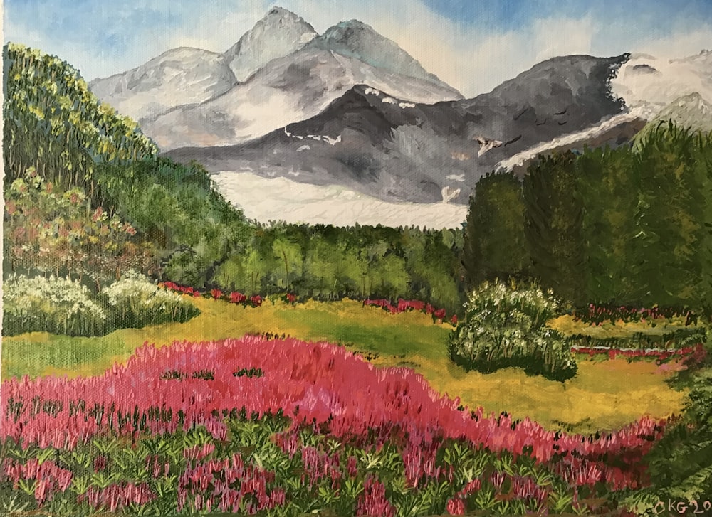 campo de flor cor-de-rosa perto da montanha durante o dia