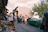 A lively village market scene with stalls full of fresh produce and handmade crafts.