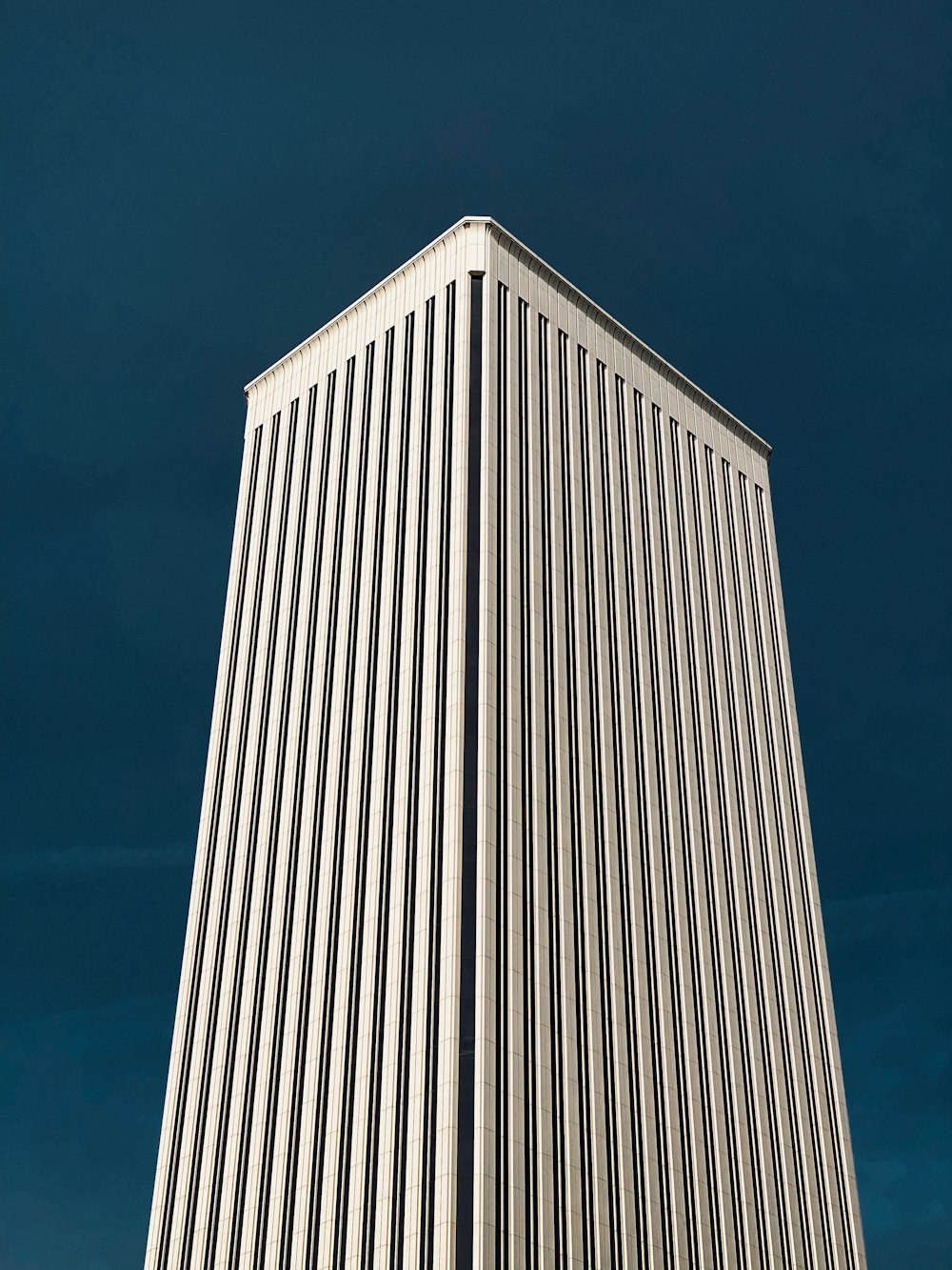 gray concrete building under blue sky during daytime