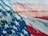 A close-up of a patriotic t-shirt featuring bold graphics and vibrant colors.