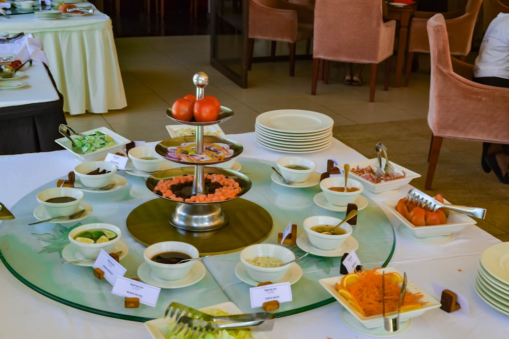 brown wooden table with plates and bowls