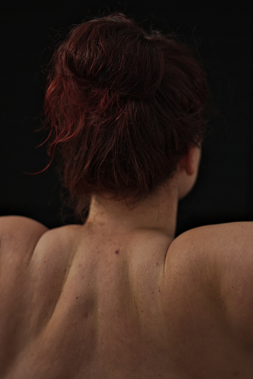 topless woman with red hair
