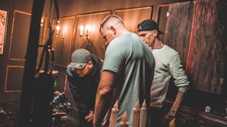 Expert team member testing a TV after panel replacement in a bright service room