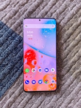 A smartphone screen displaying latest government job notifications with date tags.