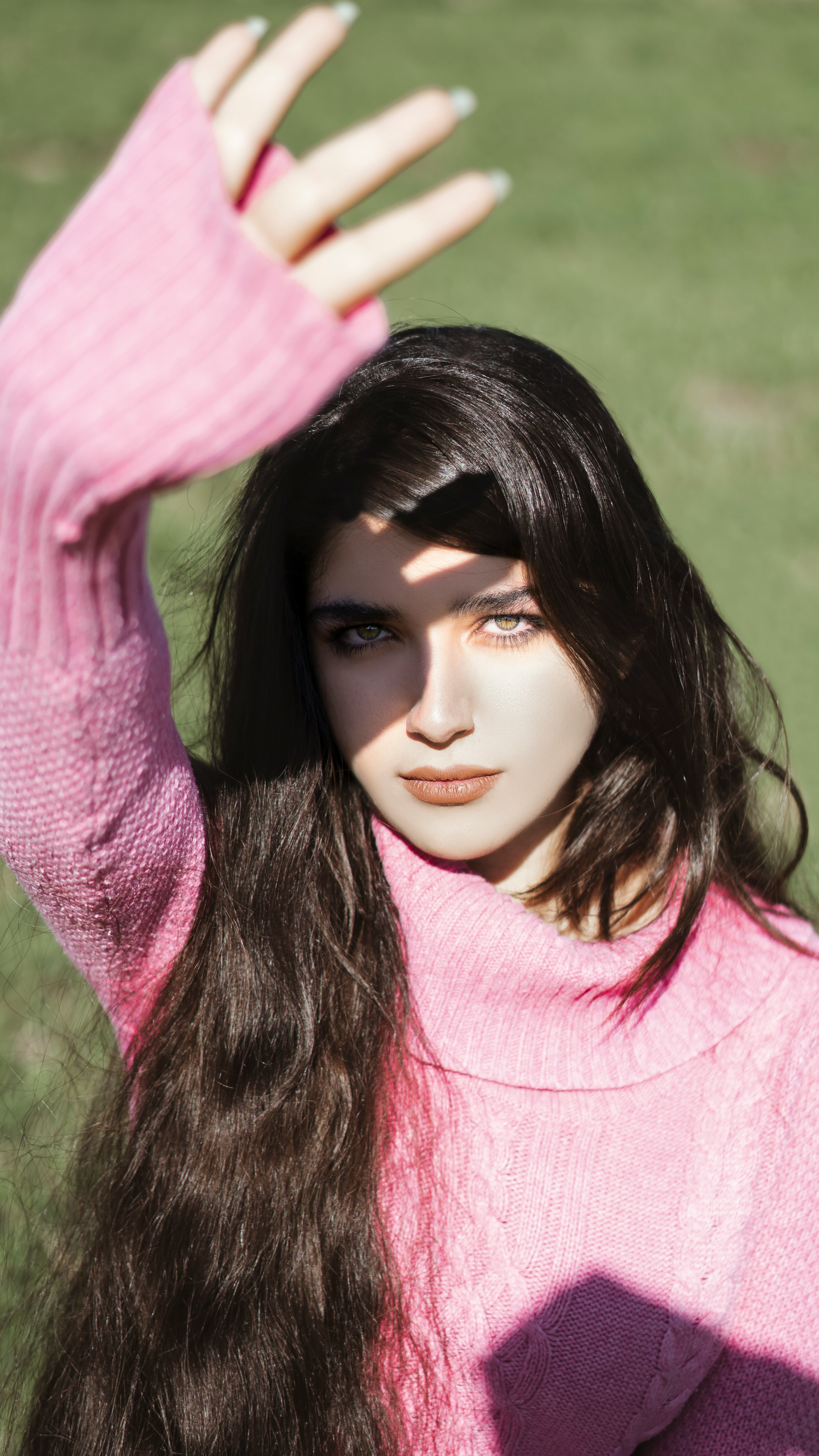 woman in pink long sleeve shirt