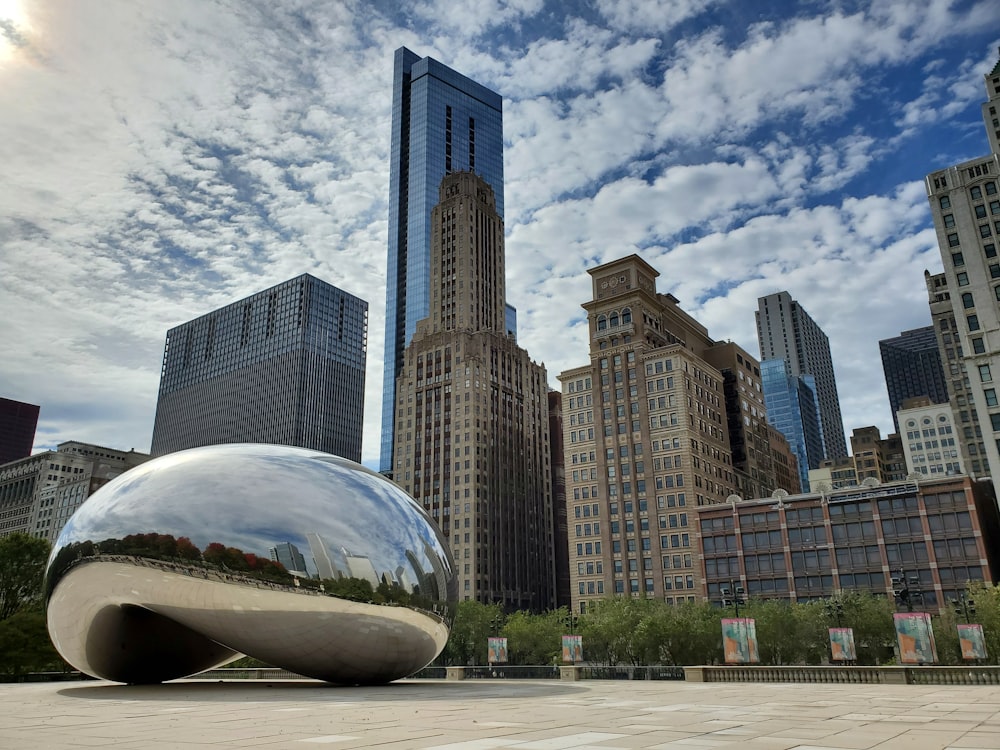 cloud gate in city during daytime