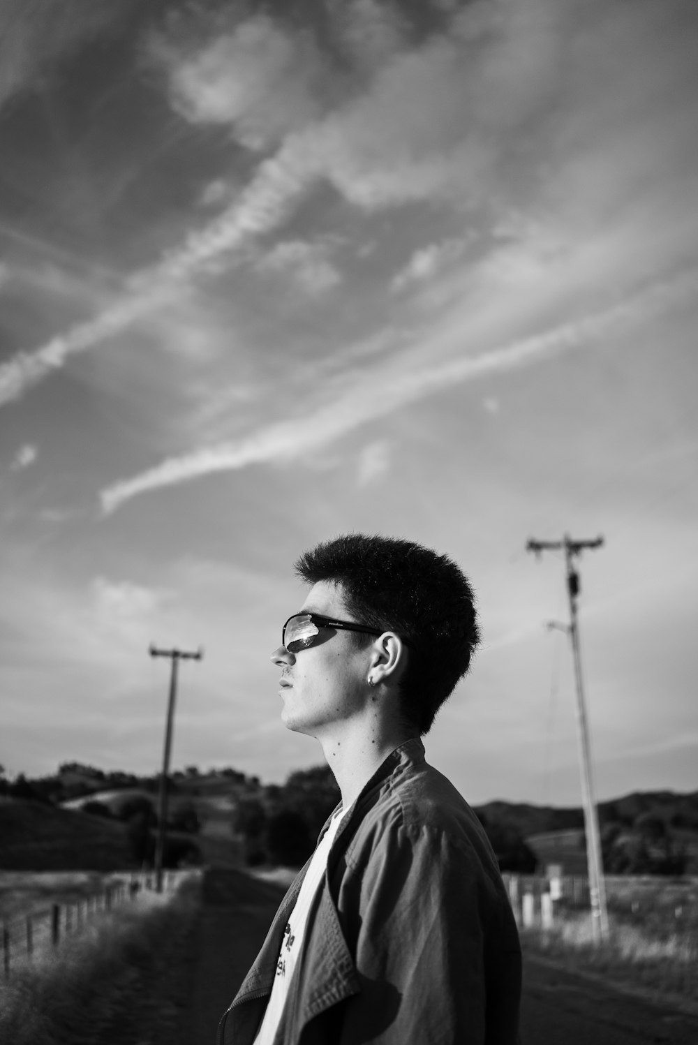 grayscale photo of man wearing sunglasses