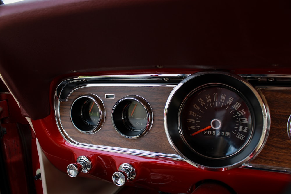 red and silver car instrument panel cluster