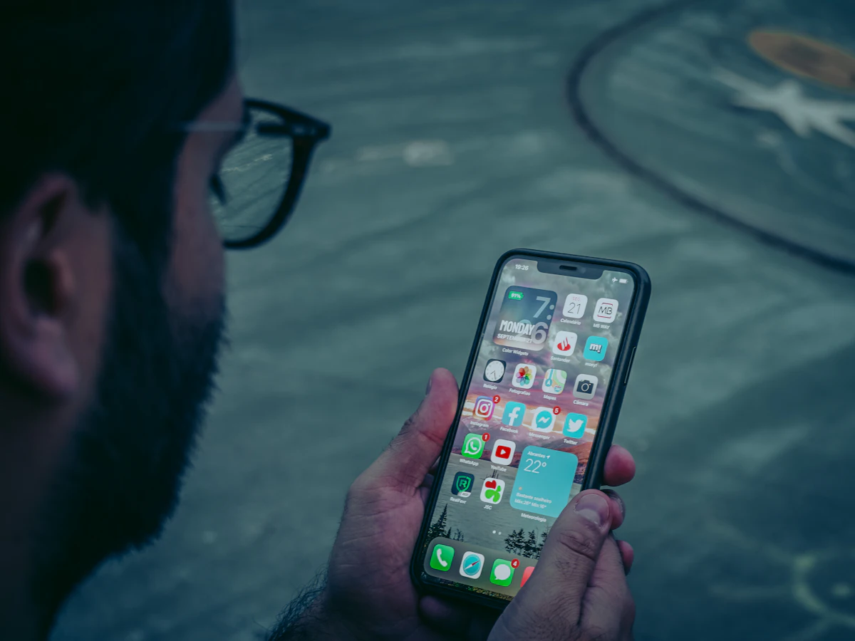 Person holding a smartphone for mobile banking