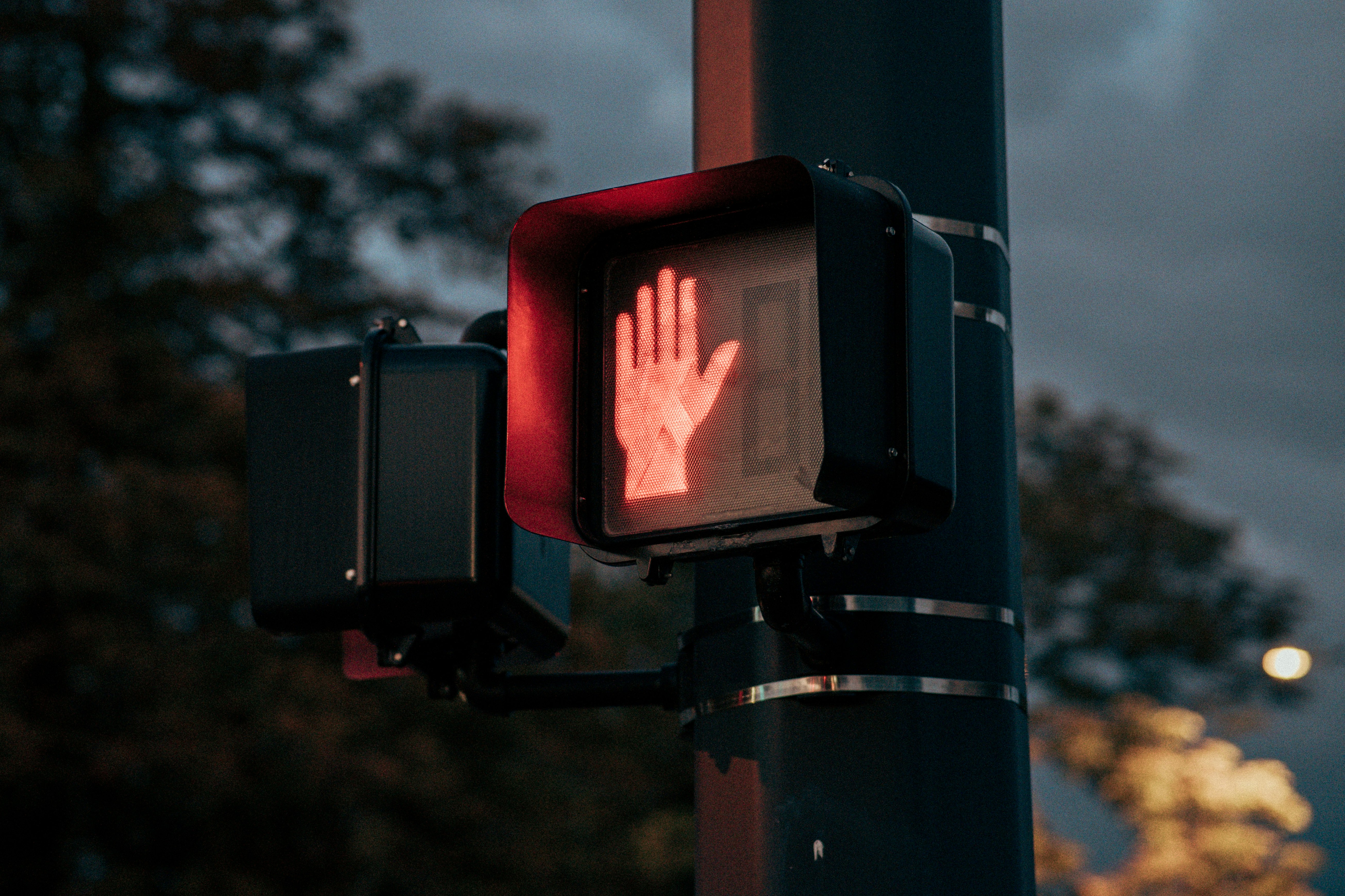 Do-not-walk sign shines on a warm, summer evening in Connecticut. 