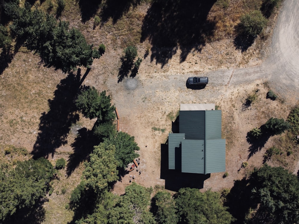 brown concrete building on brown dirt ground