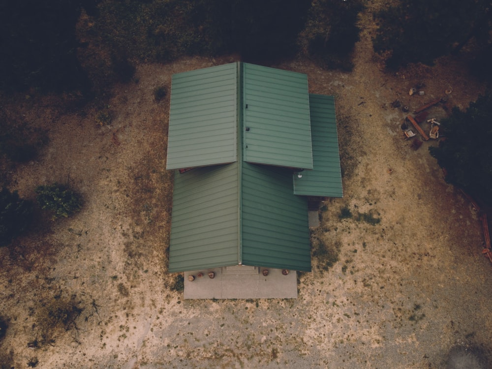 green and white wooden house