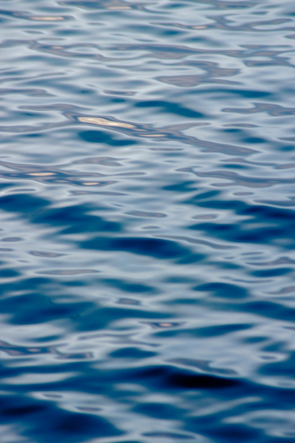 blue and white body of water