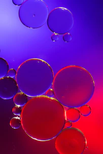 Glowing purple and cyan liquidity pool visualization on a dark futuristic background.