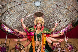 woman in green and gold traditional dress