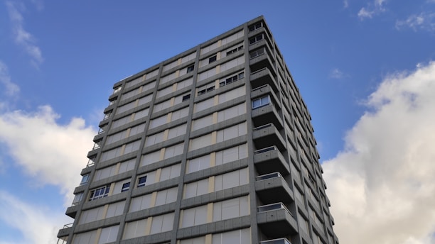 white concrete building under blue sky during daytime