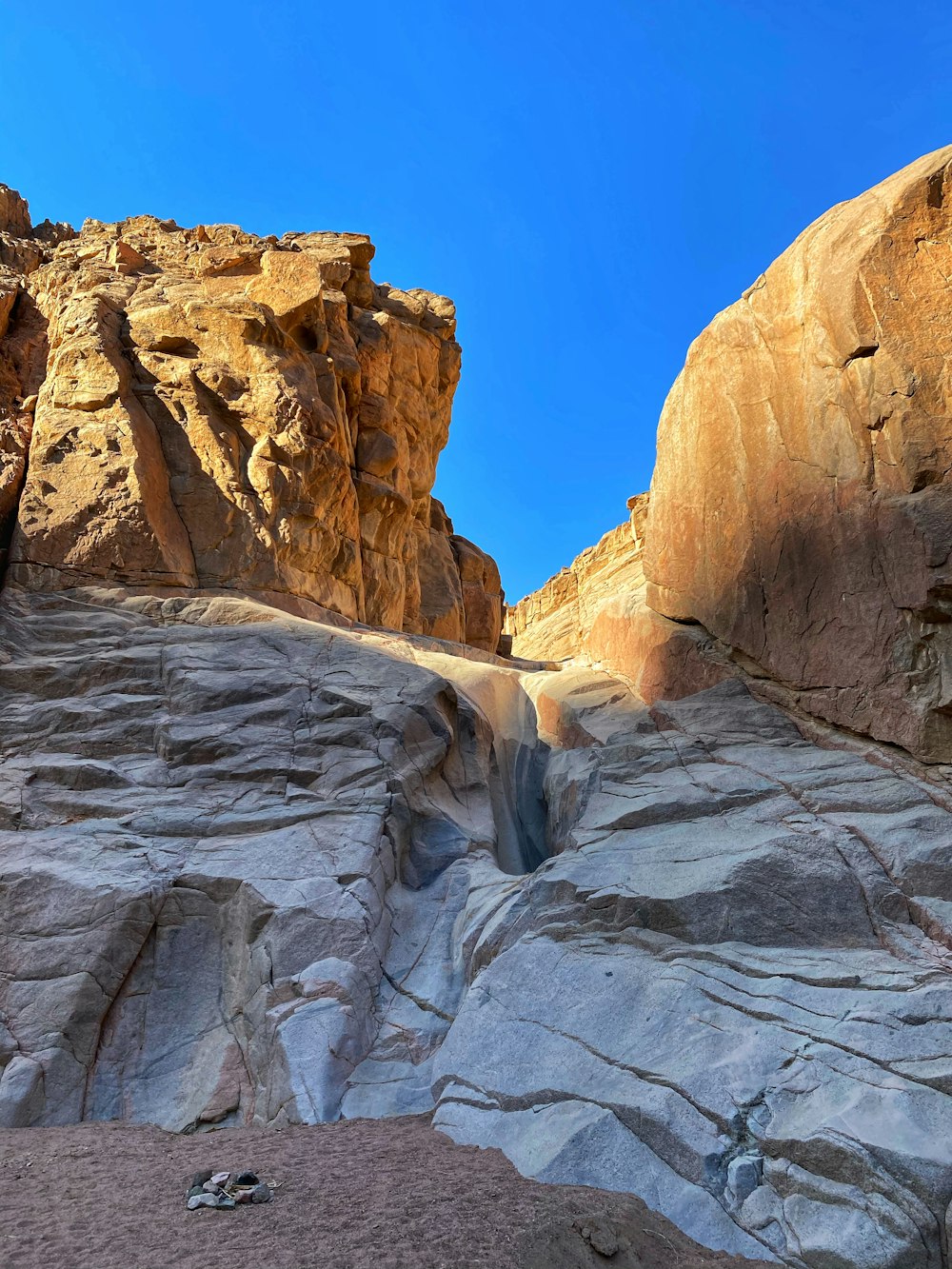 brown rocky mountain under blue sky during daytime