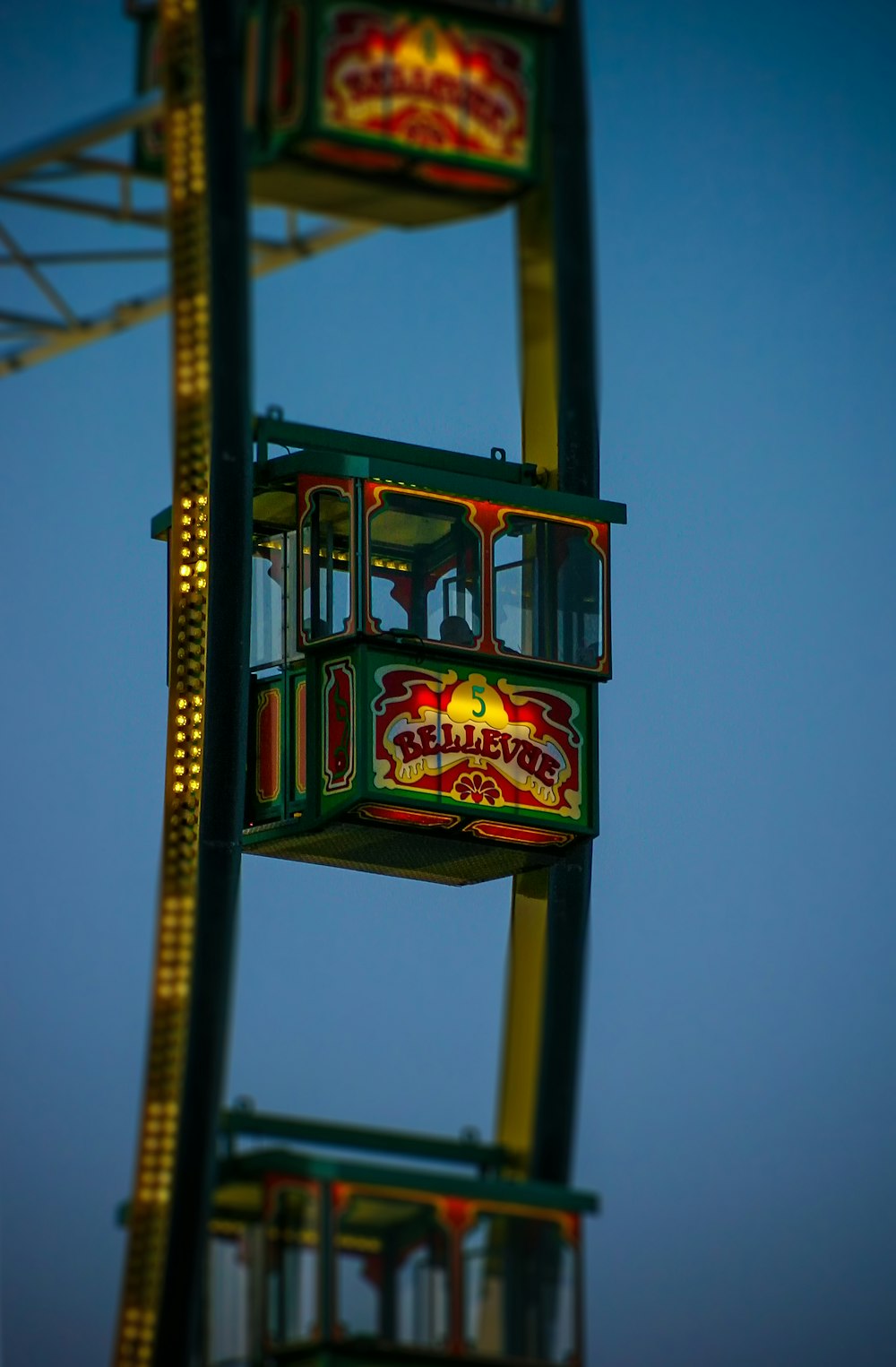 green and red wooden hanging signage