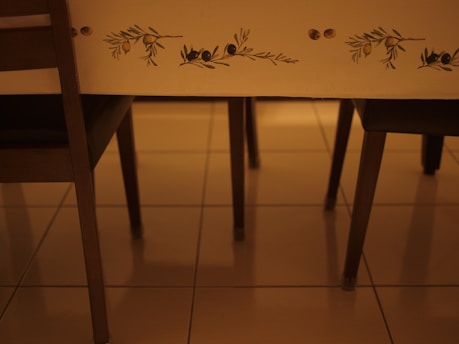 brown wooden chair beside table