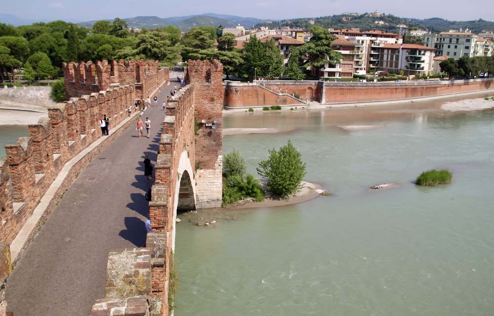 brown concrete bridge over river