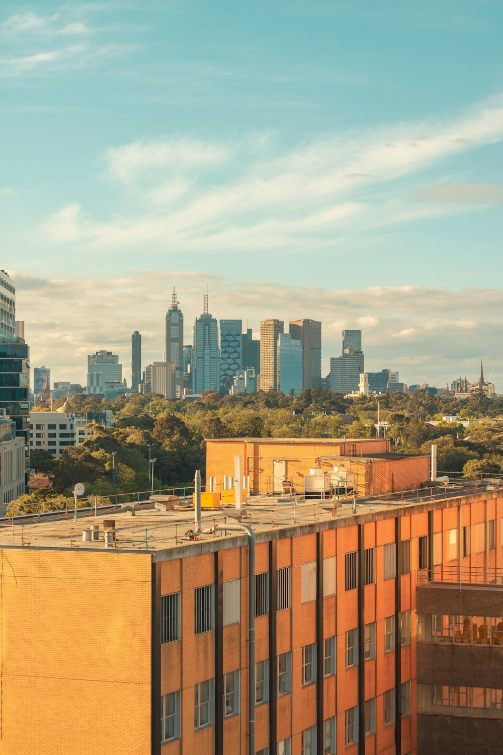 city buildings under blue sky during daytime