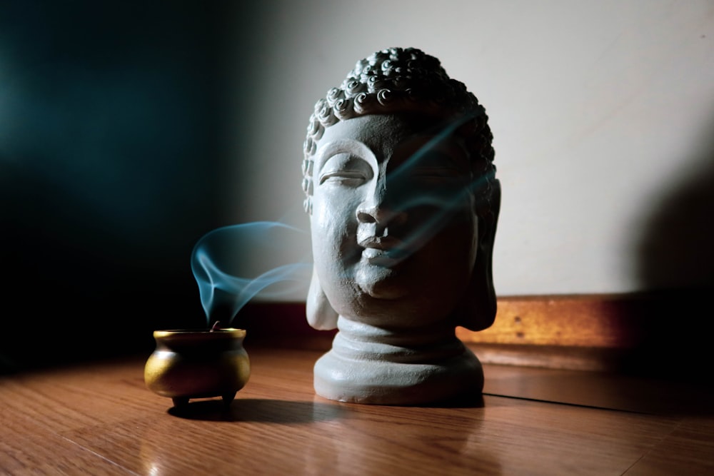 gray ceramic bust of a man