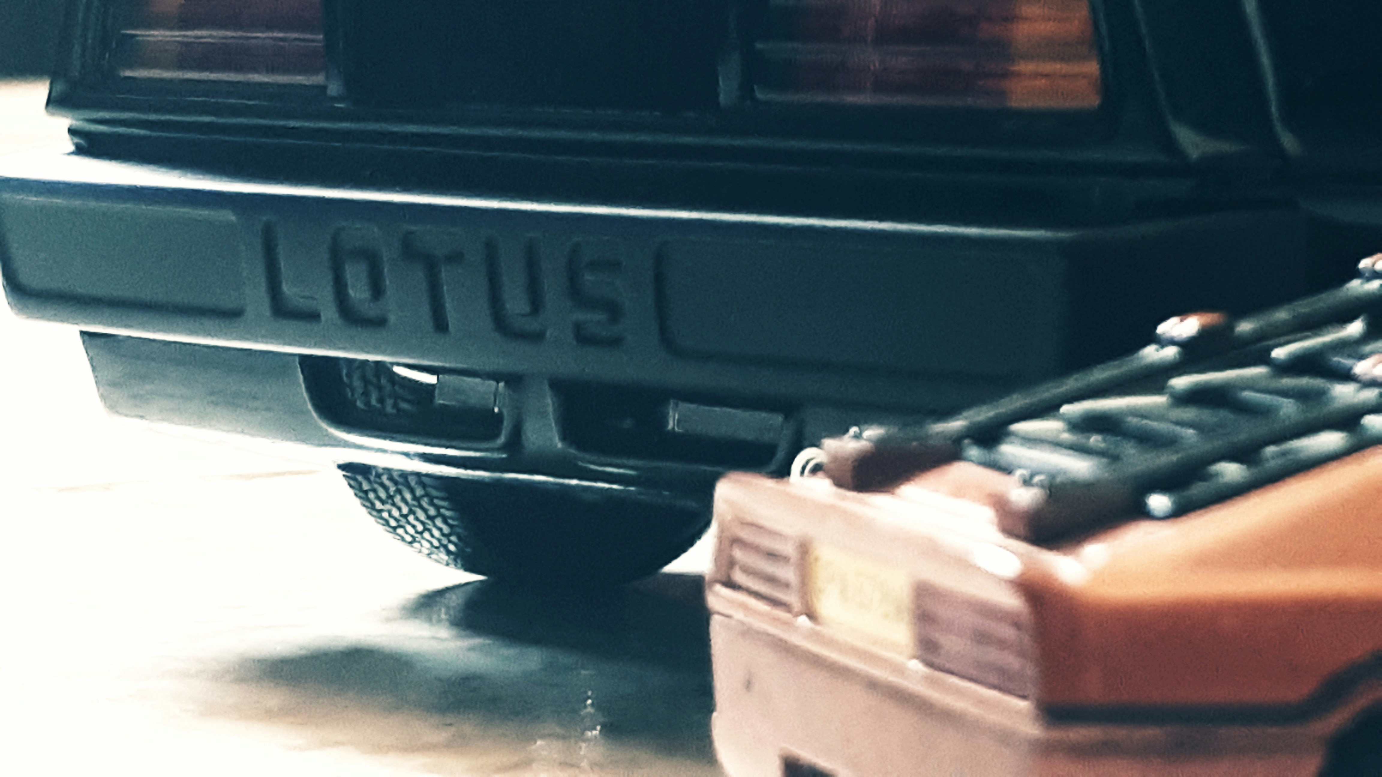 black and yellow truck on gray concrete floor