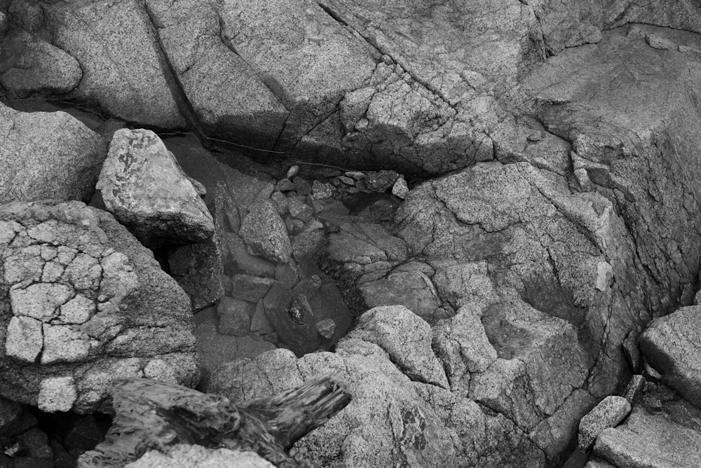 gray scale photo of rock formation
