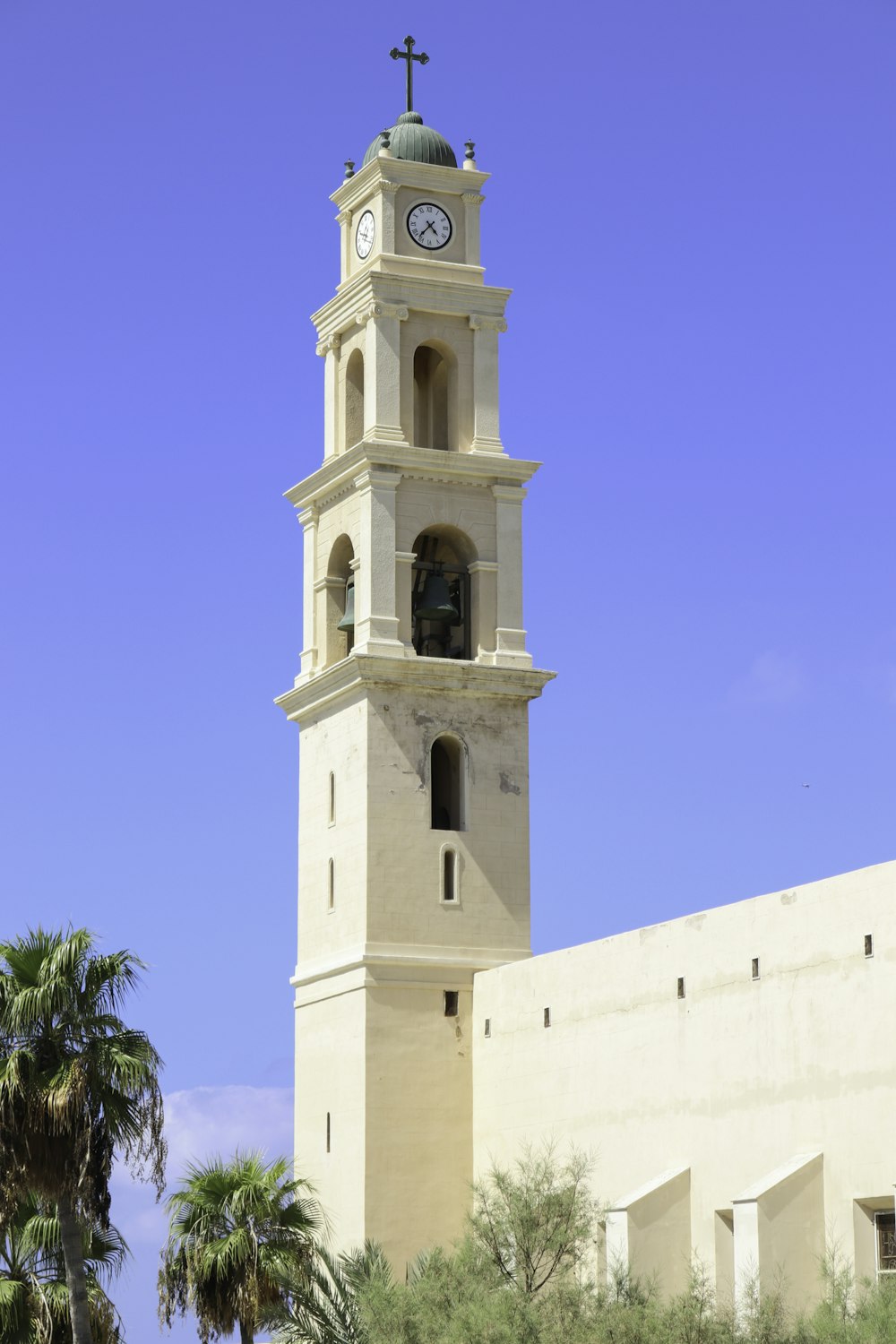 white concrete building under blue sky during daytime