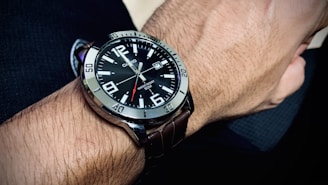 Watch displayed on a wrist during a casual outdoor date