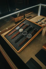 Elegant display of premium wristwatches inside donreloj's physical store with modern lighting.