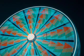 A vibrant digital wheel showing multiple bright colors spinning rapidly.