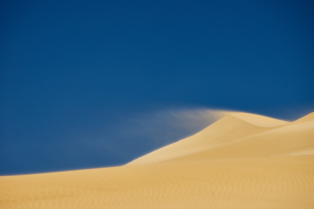 desert under blue sky during daytime